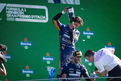 Race winner Daniel Ricciardo (AUS) McLaren celebrates on the podium with Lando Norris (GBR) McLaren and Zak Brown (USA)