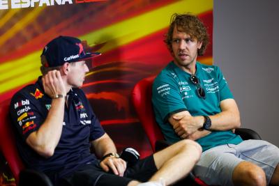 Sebastian Vettel (GER) Aston Martin F1 Team (Right) and Max Verstappen (NLD) Red Bull Racing in the FIA Press Conference.