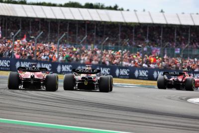 Max Verstappen (NLD) Red Bull Racing RB18 leads Carlos Sainz Jr (ESP) Ferrari F1-75. Formula 1 World Championship, Rd 10,