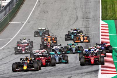 Max Verstappen (NLD) Red Bull Racing RB18 leads at the start. Formula 1 World Championship, Rd 11, Austrian Grand Prix,