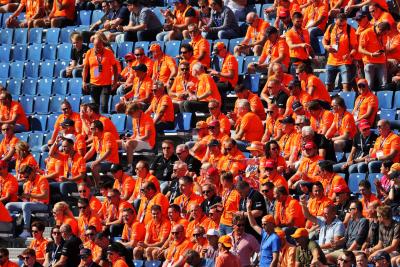 Circuit atmosphere - fans in the grandstand. Formula 1 World Championship, Rd 14, Dutch Grand Prix, Zandvoort,