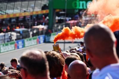 Circuit atmosphere - fans in the grandstand with a flare. Formula 1 World Championship, Rd 14, Dutch Grand Prix,