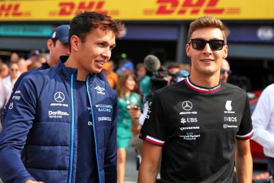 (L to R): Alexander Albon (THA) Williams Racing and George Russell (GBR) Mercedes AMG F1 on the drivers parade. Formula 1