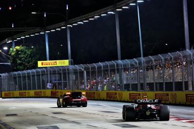 Sergio Perez (MEX) Red Bull Racing RB18 leads behind the Mercedes AMG FIA Safety Car. Formula 1 World Championship, Rd 17,