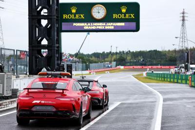 FIA Medical Car and FIA Safety Car at the end of the pit lane. Formula 1 World Championship, Rd 18, Japanese Grand Prix,