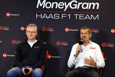 (L to R): Alex Holmes, MoneyGram International Chairman and CEO with Guenther Steiner (ITA) Haas F1 Team Prinicipal -