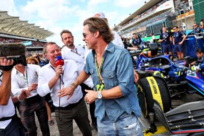 Brad Pitt (USA) Actor with Martin Brundle (GBR) Sky Sports Commentator on the grid. Formula 1 World Championship, Rd 19,