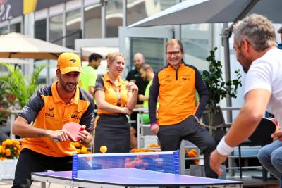 Daniel Ricciardo (AUS) McLaren plays table tennis in the paddock with Timo Glock (GER). Formula 1 World Championship, Rd