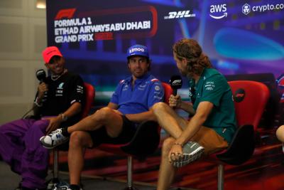Sebastian Vettel (GER) Aston Martin F1 Team with Fernando Alonso (ESP) Alpine F1 Team and Lewis Hamilton (GBR) Mercedes AMG