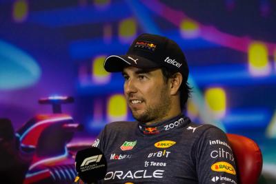 Sergio Perez (MEX) Red Bull Racing in the post race FIA Press Conference. Formula 1 World Championship, Rd 22, Abu Dhabi