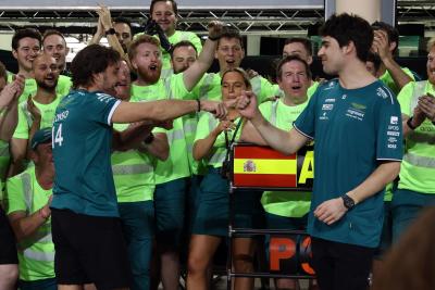 (L to R): Fernando Alonso (ESP) Aston Martin F1 Team celebrates his third position walks the circuit with the team team mate