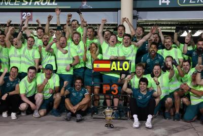 (L to R): Fernando Alonso (ESP) Aston Martin F1 Team celebrates his third position walks the circuit with the team team mate