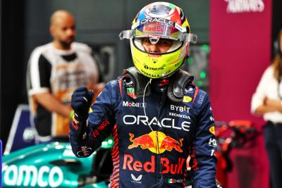 Sergio Perez (MEX) Red Bull Racing celebrates his pole position in qualifying parc ferme. Formula 1 World Championship, Rd