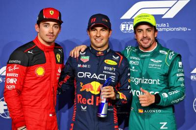 Qualifying top three in parc ferme (L to R): Charles Leclerc (MON) Ferrari, second; Sergio Perez (MEX) Red Bull Racing, pole