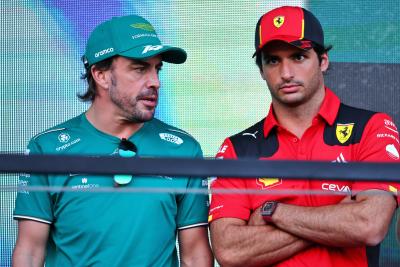 (L to R): Fernando Alonso (ESP) Aston Martin F1 Team with Carlos Sainz Jr (ESP) Ferrari on the drivers' parade. Formula 1