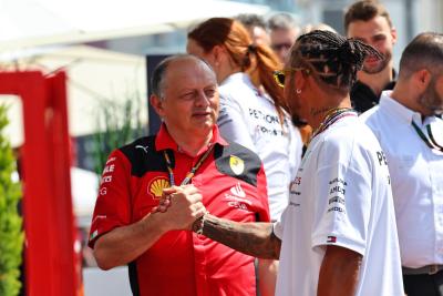 (L to R): Frederic Vasseur (FRA) Ferrari Team Principal with Lewis Hamilton (GBR) Mercedes AMG F1. Formula 1 World