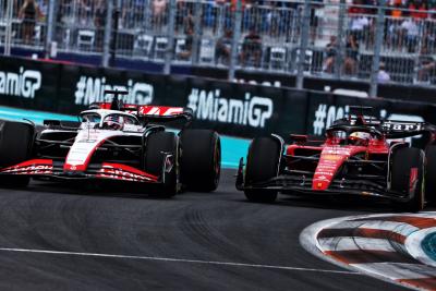 (L to R): Kevin Magnussen (DEN) Haas VF-23 and Charles Leclerc (MON) Ferrari SF-23 battle for position. Formula 1 World