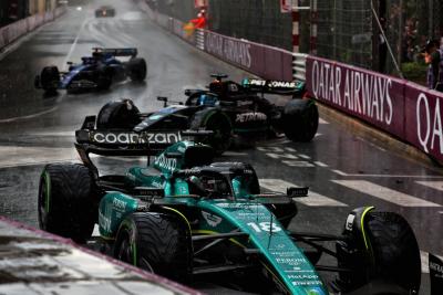 Lance Stroll (CDN) Aston Martin F1 Team AMR23 and George Russell (GBR) Mercedes AMG F1 W14 run wide. Formula 1 World