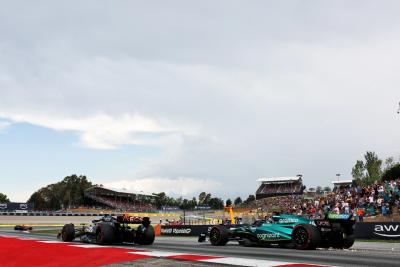 George Russell (GBR) Mercedes AMG F1 W14 and Lance Stroll (CDN) Aston Martin F1 Team AMR23. Formula 1 World Championship,