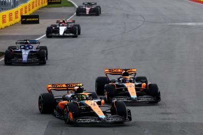 Lando Norris (GBR) McLaren MCL60 and Oscar Piastri (AUS) McLaren MCL60 battle for position. Formula 1 World Championship,