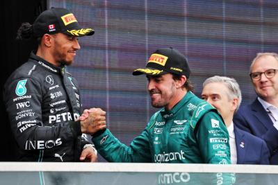 Fernando Alonso (ESP) Aston Martin F1 Team celebrates his second position with third placed Lewis Hamilton (GBR) Mercedes