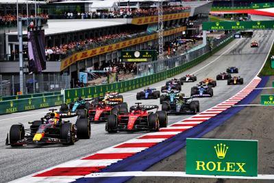 Max Verstappen (NLD) Red Bull Racing RB19 leads at the start of the race. Formula 1 World Championship, Rd 10, Austrian