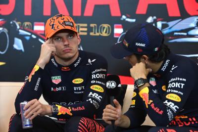 (L to R): Max Verstappen (NLD) Red Bull Racing and Sergio Perez (MEX) Red Bull Racing in the post race FIA Press