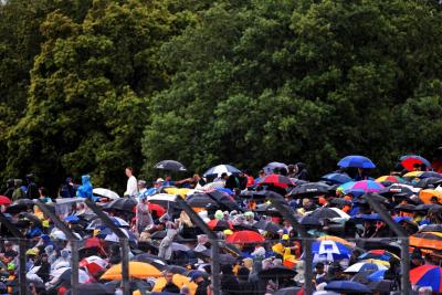 Circuit atmosphere - fans in the rain. Formula 1 World Championship, Rd 11, British Grand Prix, Silverstone, England,