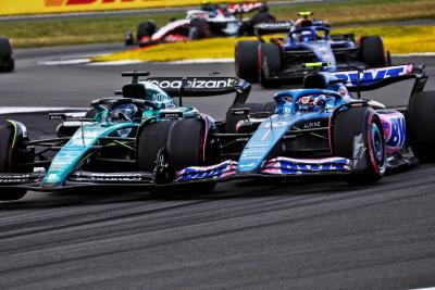 (L to R): Logan Sargeant (USA) Williams Racing FW45 and Pierre Gasly (FRA) Alpine F1 Team A523 battle for position.
