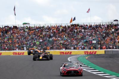 Max Verstappen (NLD) Red Bull Racing RB19 leads behind the Mercedes AMG FIA Safety Car. Formula 1 World Championship, Rd