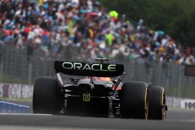 Max Verstappen (NLD) Red Bull Racing RB19 leaves the pits. Formula 1 World Championship, Rd 12, Hungarian Grand Prix,