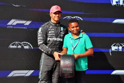 (L to R): Lewis Hamilton (GBR) Mercedes AMG F1 receives the Pirelli Pole Position Award from Zac (GBR) Sky F1