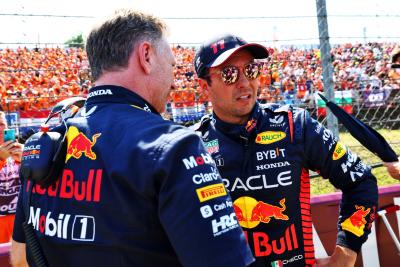 (L to R): Christian Horner (GBR) Red Bull Racing Team Principal with Sergio Perez (MEX) Red Bull Racing on the grid.
