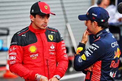 (L to R): Charles Leclerc (MON) Ferrari with Sergio Perez (MEX) Red Bull Racing in qualifying parc ferme. Formula 1 World