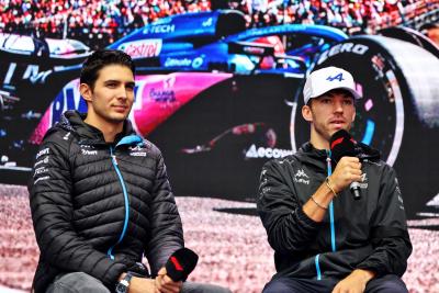 (L to R): Esteban Ocon (FRA) Alpine F1 Team and Pierre Gasly (FRA) Alpine F1 Team on the FanZone Stage. Formula 1 World