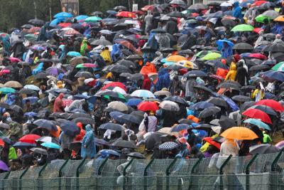 Circuit atmosphere - fans in the rain. Formula 1 World Championship, Rd 13, Belgian Grand Prix, Spa Francorchamps,