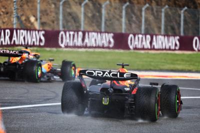 Max Verstappen (NLD) Red Bull Racing RB19 leaves the pits behind Oscar Piastri (AUS) McLaren MCL60. Formula 1 World