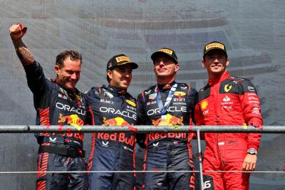 The podium (L to R): Greg Reeson (GBR) Red Bull Racing Tyre Technician; Sergio Perez (MEX) Red Bull Racing, second; Max