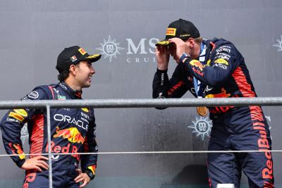 Sergio Perez (MEX) Red Bull Racing and Max Verstappen (NLD) Red Bull Racing. Formula 1 World Championship, Rd 13, Belgian