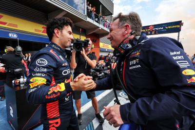 (L to R): Sergio Perez (MEX) Red Bull Racing celebrates his second position with Christian Horner (GBR) Red Bull Racing Team
