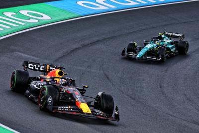 Max Verstappen (NLD) Red Bull Racing RB19 leads Fernando Alonso (ESP) Aston Martin F1 Team AMR23. Formula 1 World