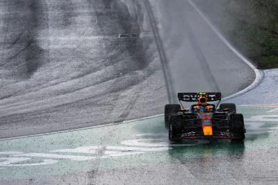 Sergio Perez (MEX) Red Bull Racing RB19 runs wide at Tarzan. Formula 1 World Championship, Rd 14, Dutch Grand Prix,