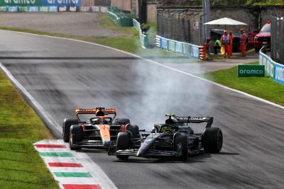 Lewis Hamilton (GBR) Mercedes AMG F1 W14 and Oscar Piastri (AUS) McLaren MCL60 battle for position. Formula 1 World