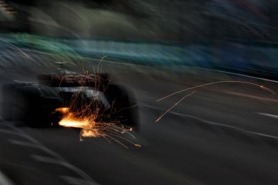 George Russell (GBR) Mercedes AMG F1 W14 sends sparks flying. Formula 1 World Championship, Rd 16, Singapore Grand Prix,
