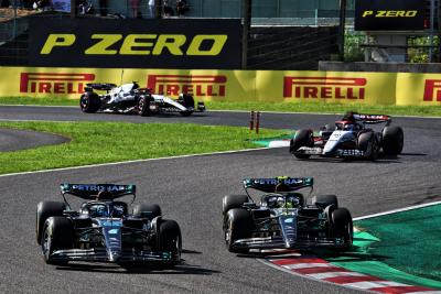 (L to R): George Russell (GBR) Mercedes AMG F1 W14 and team mate Lewis Hamilton (GBR) Mercedes AMG F1 W14 battle for