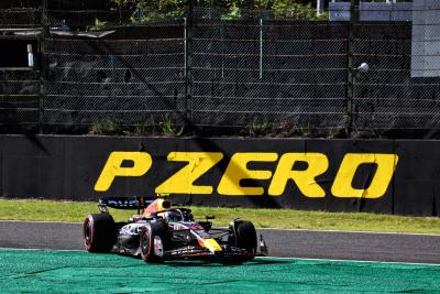 Sergio Perez (MEX) Red Bull Racing RB19 runs wide. Formula 1 World Championship, Rd 17, Japanese Grand Prix, Suzuka,