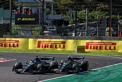 George Russell (GBR) Mercedes AMG F1 W14 and team mate Lewis Hamilton (GBR) Mercedes AMG F1 W14 battle for position.