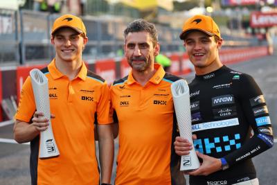 (L to R): Oscar Piastri (AUS) McLaren celebrates his third position with Andrea Stella (ITA) McLaren Team Principal and