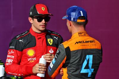 (L to R): Pole sitter Charles Leclerc (MON) Ferrari in qualifying parc ferme with second placed Lando Norris (GBR)