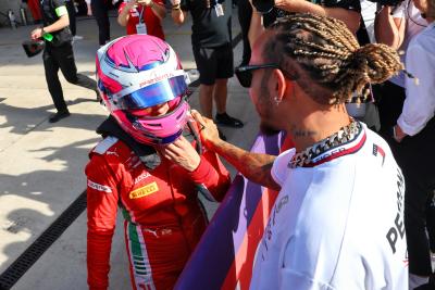 Race winner and Champion Marta Garcia (ESP) Prema Racing celebrates in parc ferme with Lewis Hamilton (GBR) Mercedes AMG